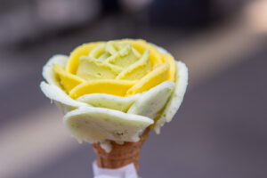 Ice cream in the shape of a rose flower with different flavors.