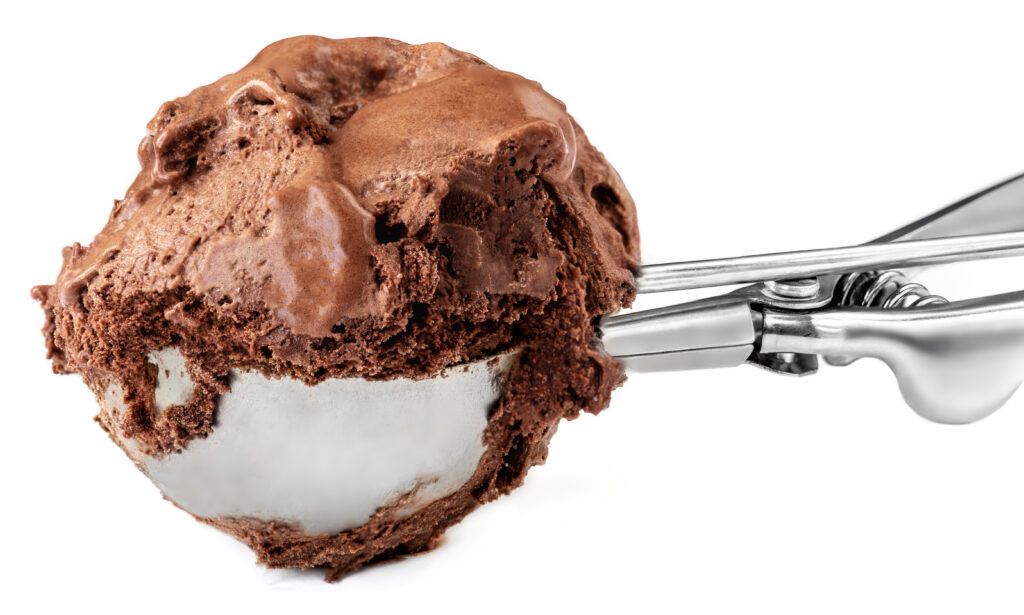 Chocolate ice cream scoop isolated on a white background. Macro