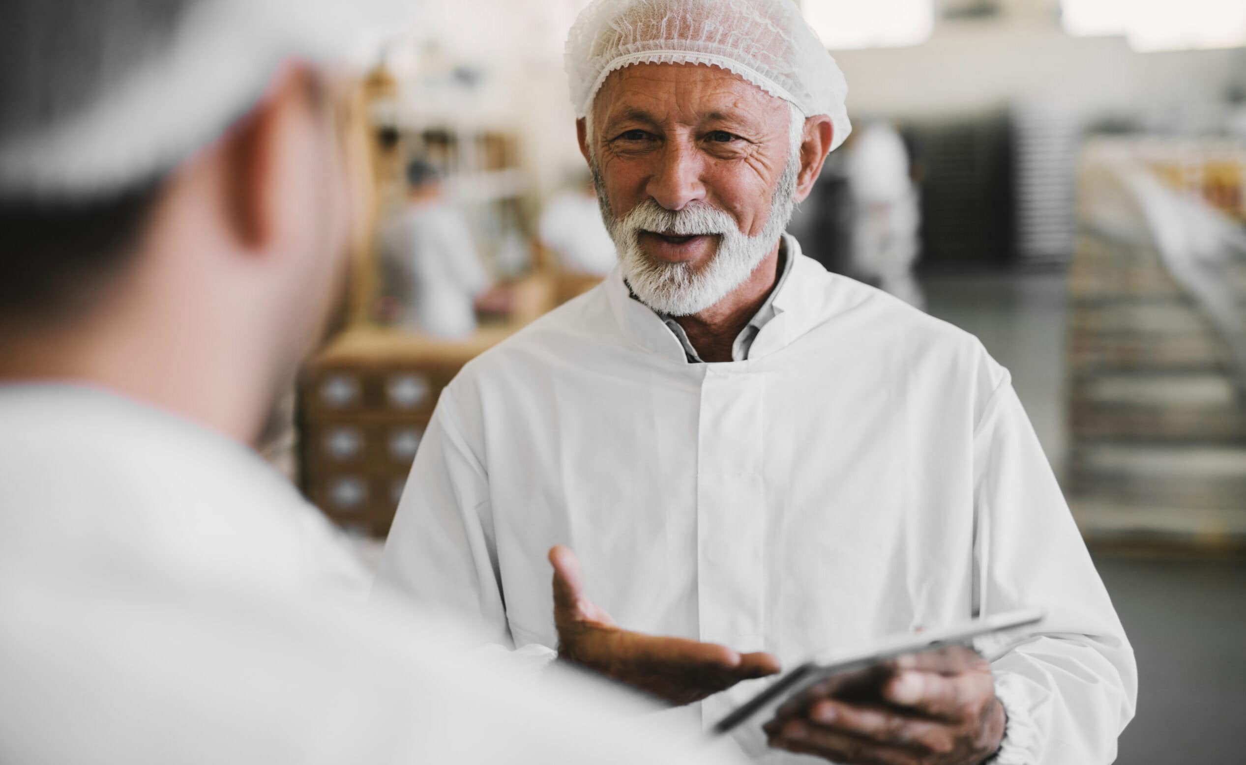 Production leader mentoring staff as part of a culture of innovation