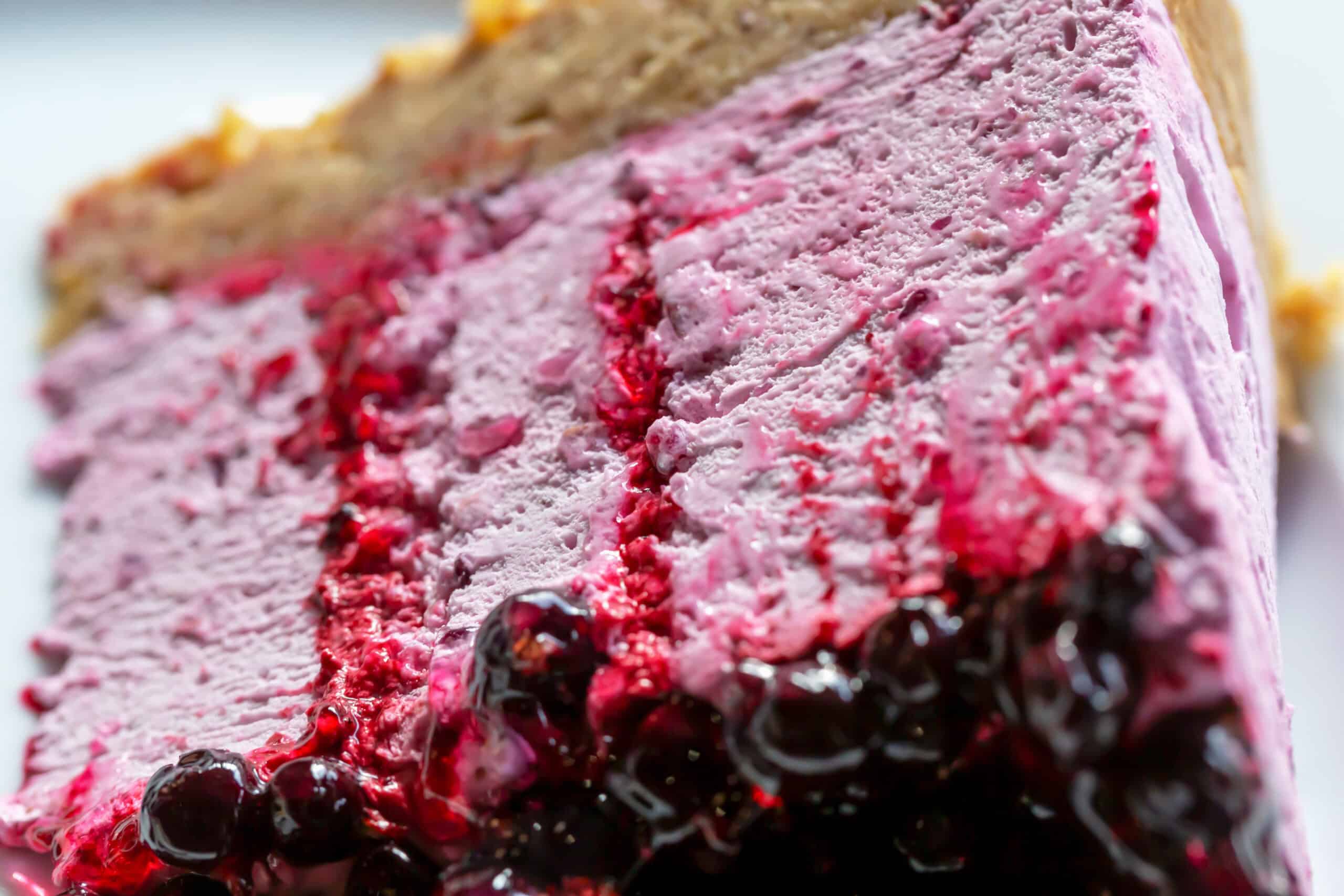 Mousse cake showing layered texture contrast with berry filling demonstrating texture innovation in bakery trends