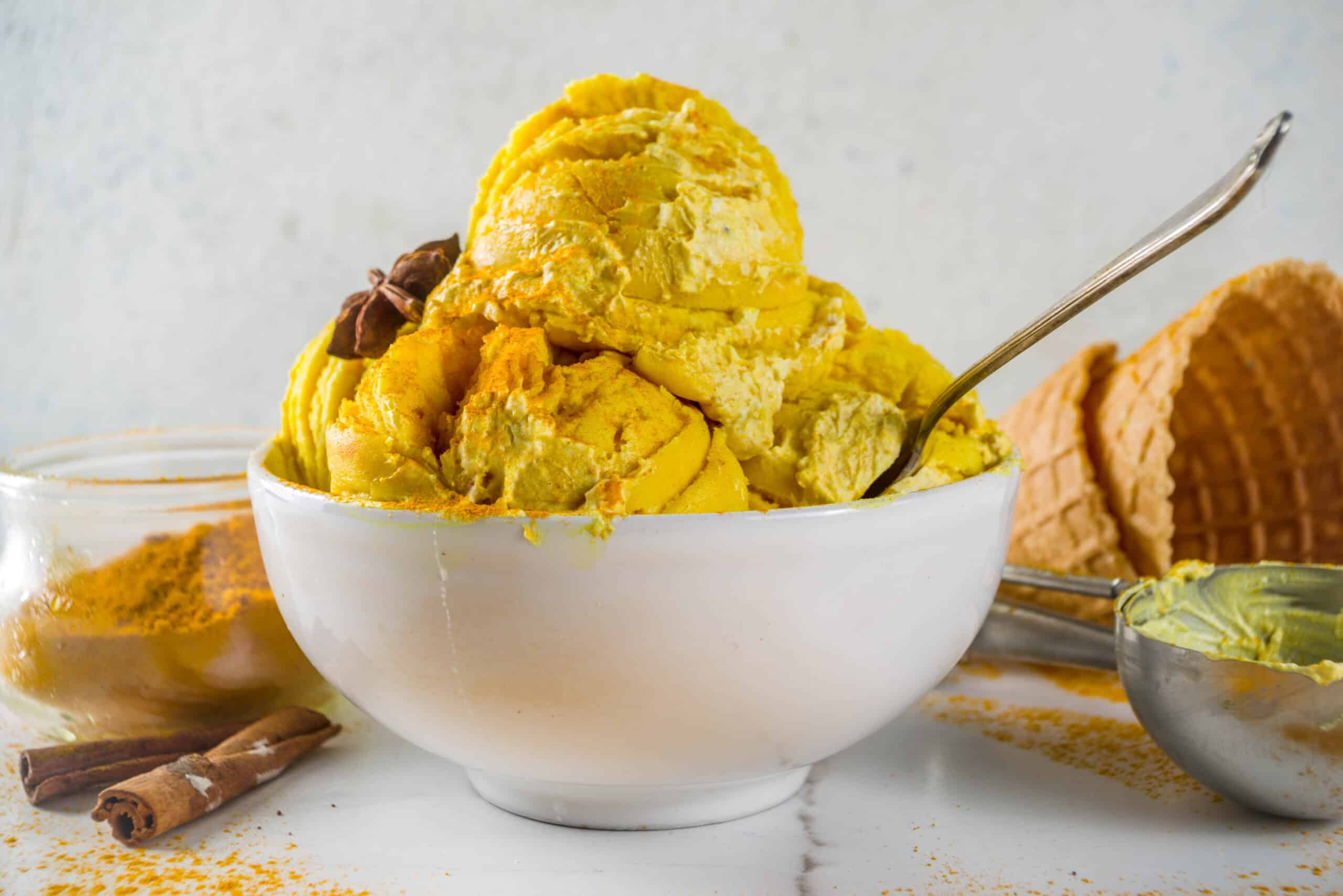 Delicious ice cream infused with functional botanicals, served in a white bowl.
