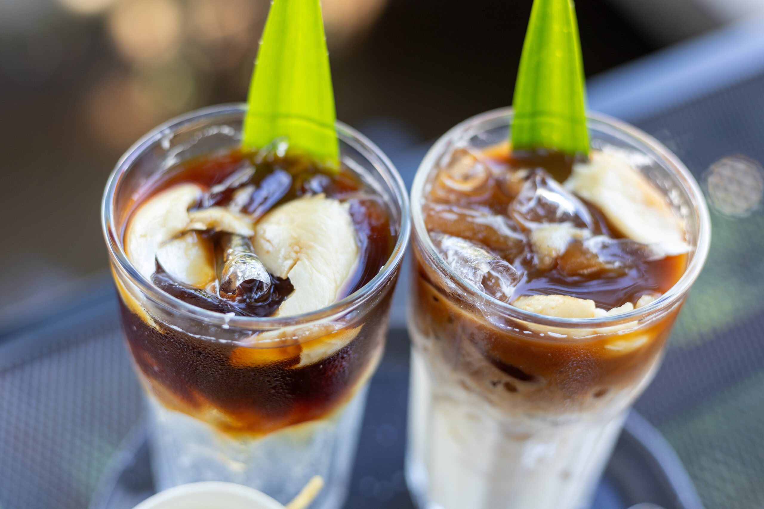 Two layered iced coffees with cream, part of ongoing food service beverage trends